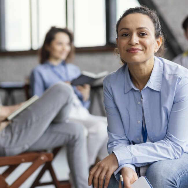 people-sitting-chairs-close-up